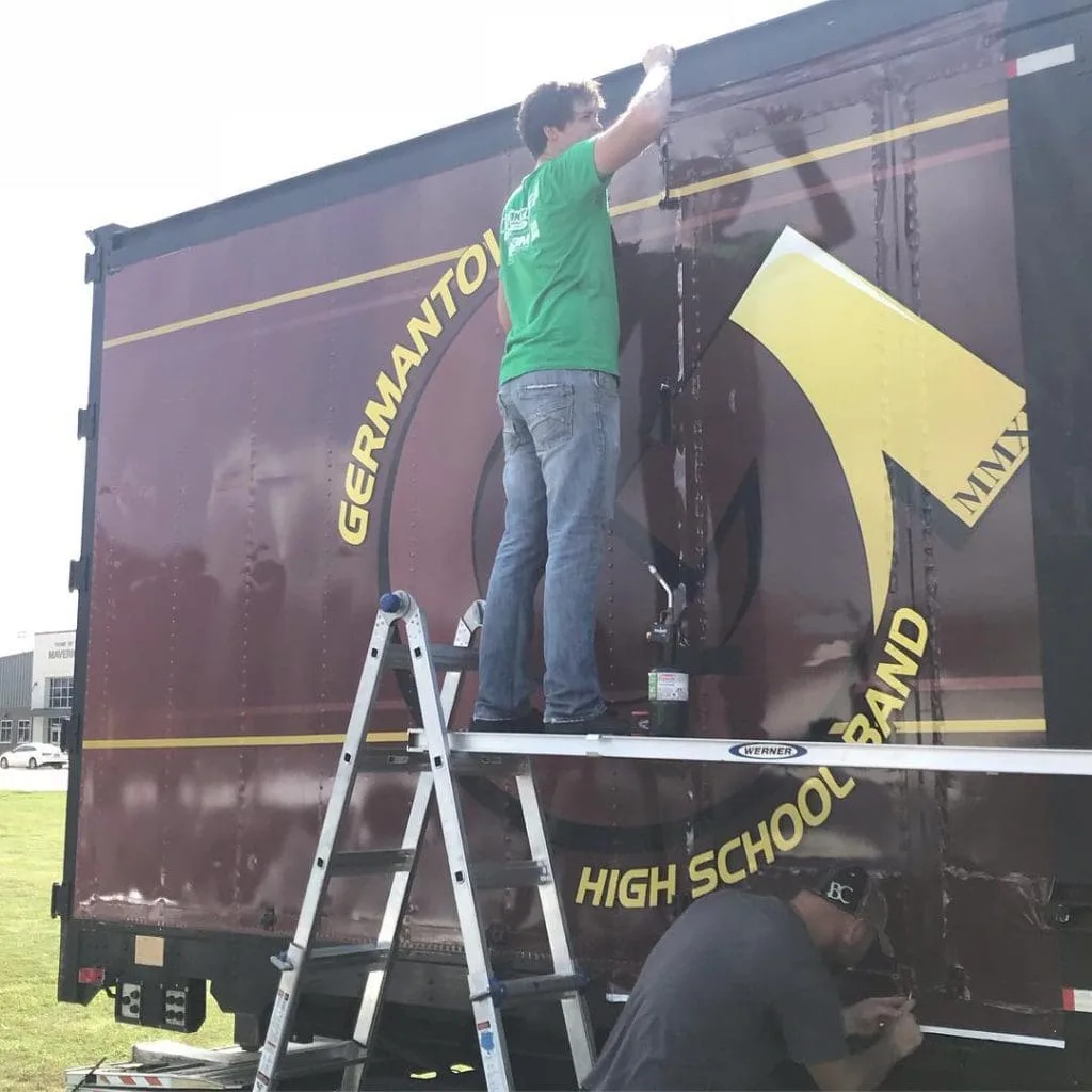 Installing a Vinyl Wrap on Bus